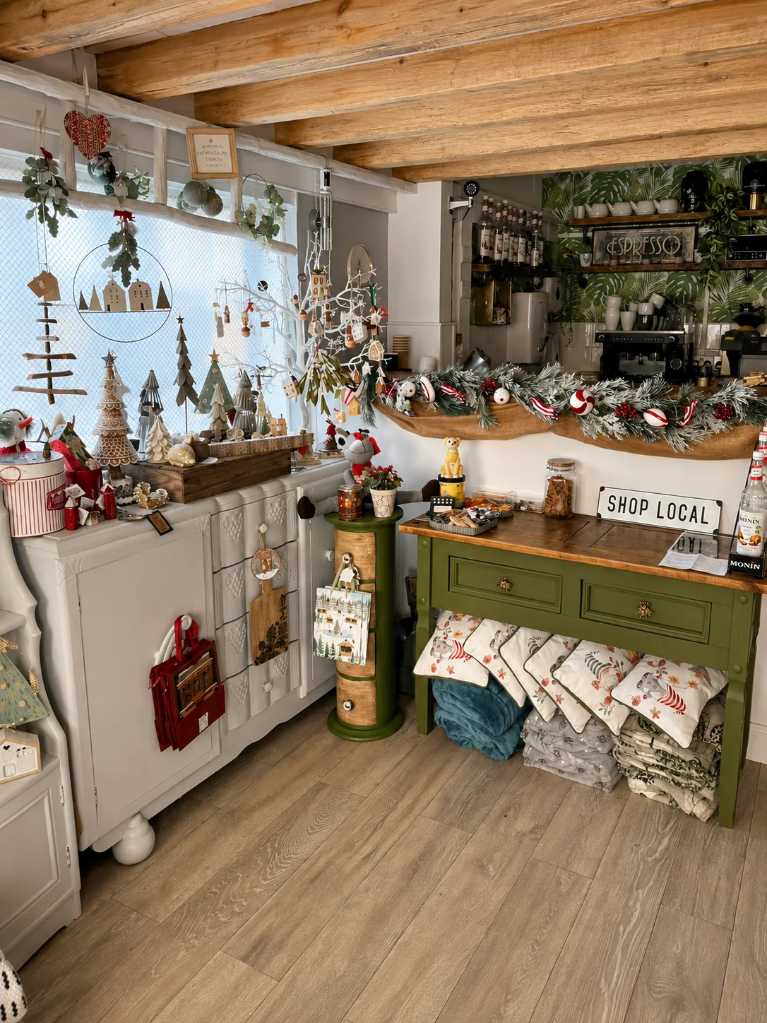 Coffee bar and shop displays inside By The Beck